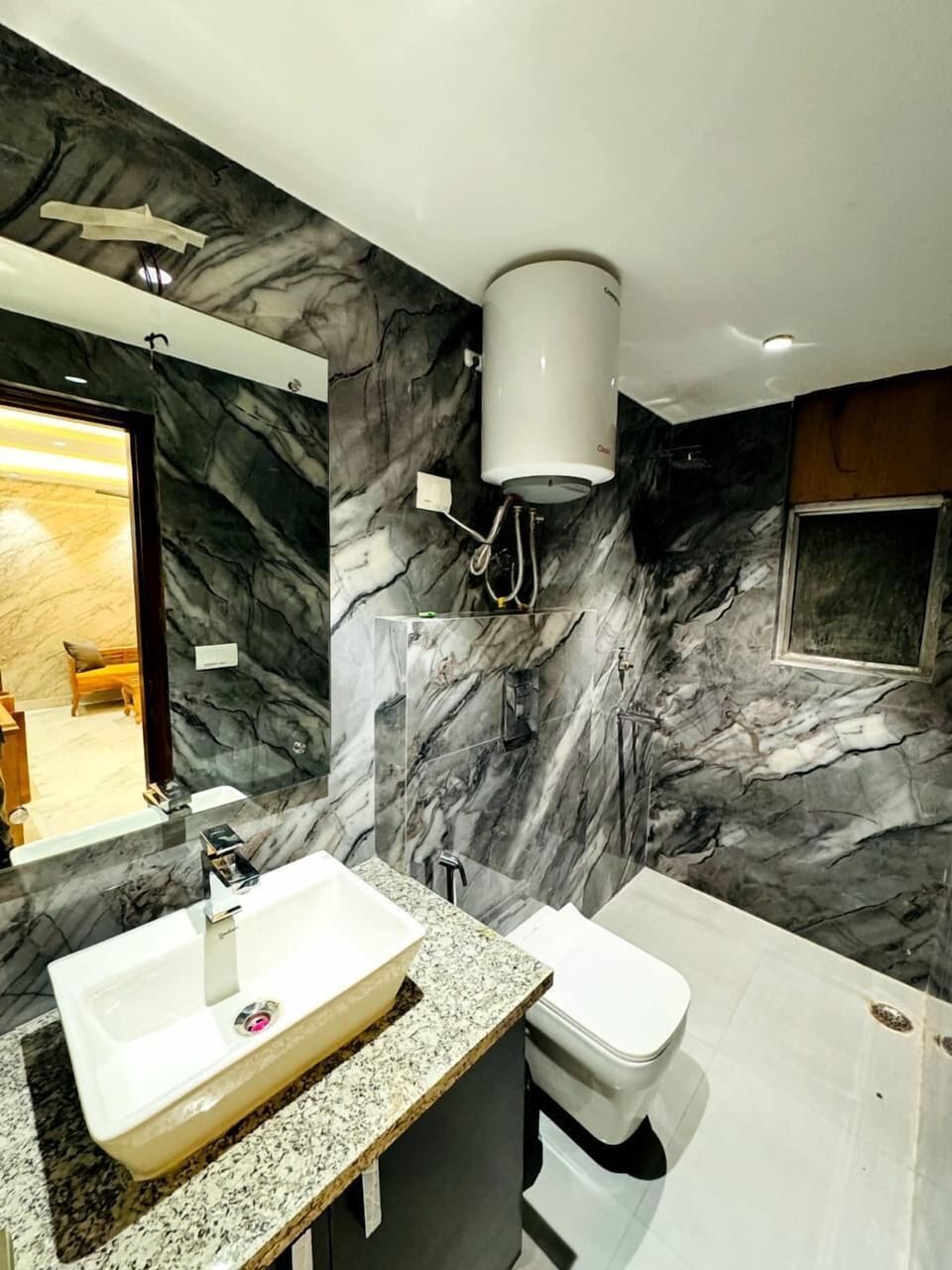 Deluxe Double Room, City View | Bathroom | Shower, slippers, towels, soap