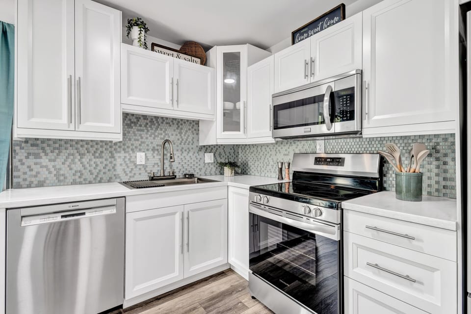 Stainless steel appliances create a modern finish