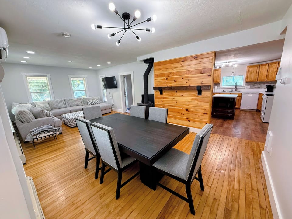 Living and dining areas are adjacent to one another and next to the kitchen.