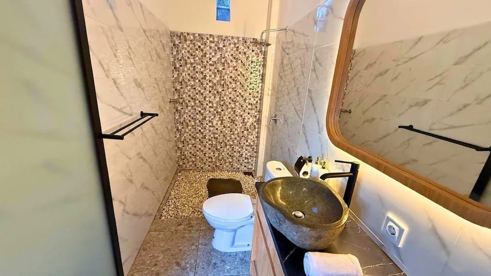 Shower, towels, soap, shampoo