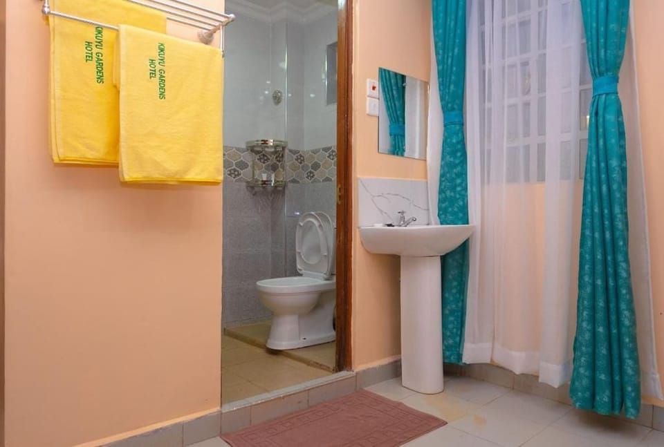 Shower, bathrobes, slippers, towels