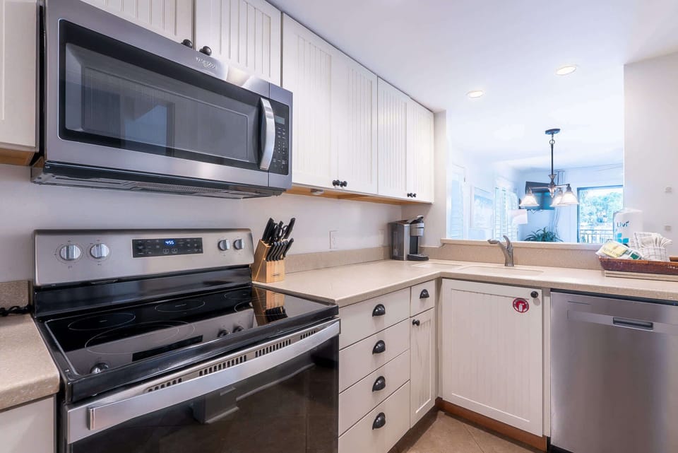 Bright kitchen with everything you need for cooking and dining.