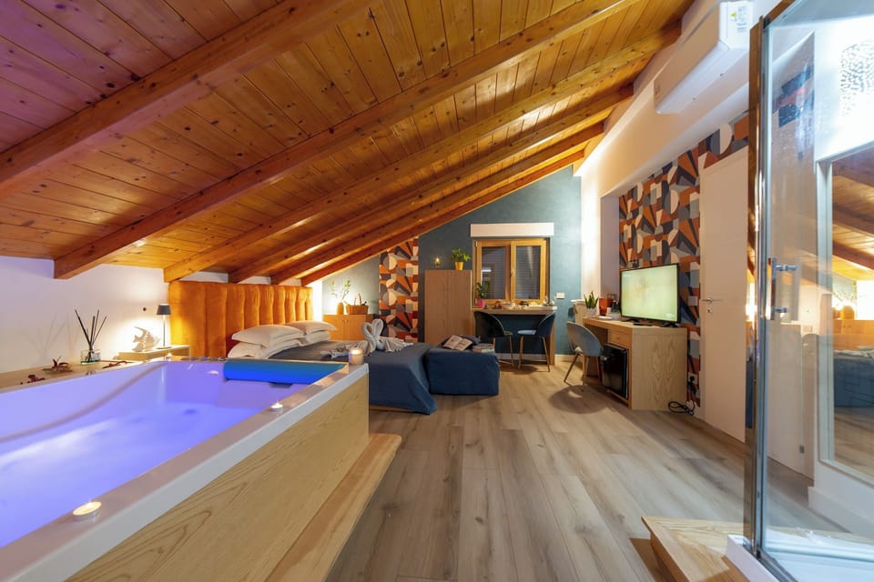 Deluxe Suite, City View | Blackout drapes, soundproofing, iron/ironing board, free WiFi