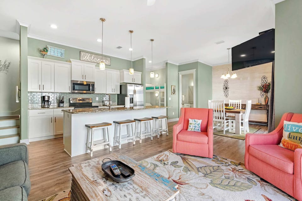 Curl up in the breezy living room & stream your favorites on the smart TV​