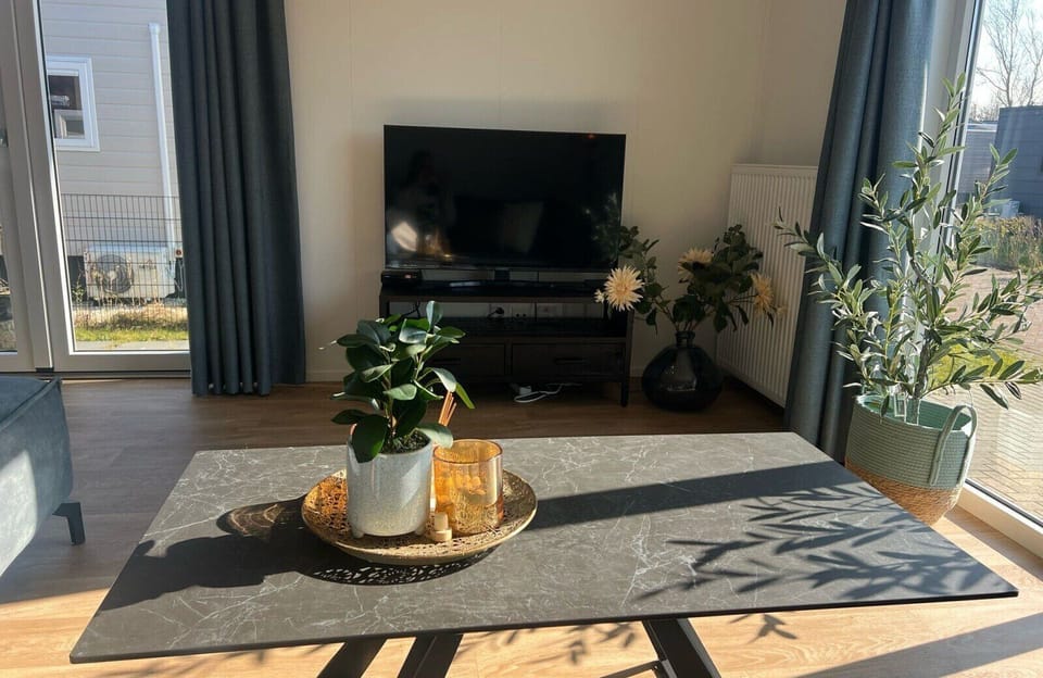 Coffee table and TV from Vakantiepark de Zeeuwse Parel - Zeebaars