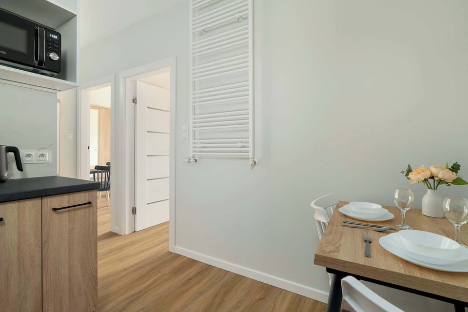 The kitchen offers a functional layout for convenient cooking.