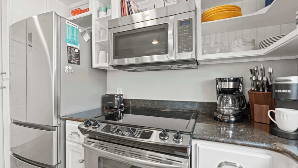 The open kitchen offers ample space & every home comfort​