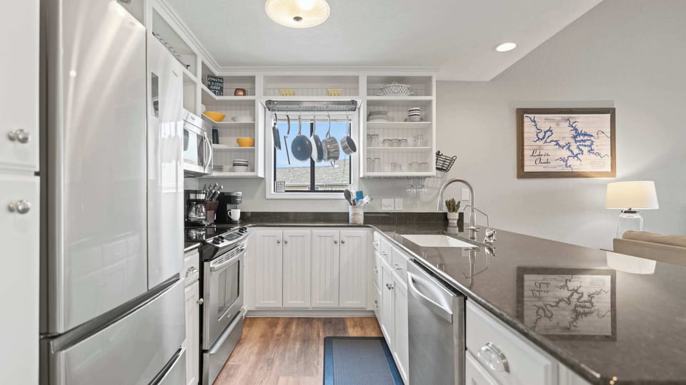The open kitchen offers ample space & every home comfort​
