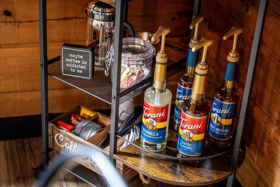 Cozy coffee bar with flavored syrups and thoughtful guest extras
