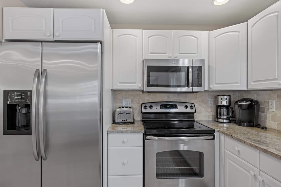 Modern kitchen with stainless steel appliances and plenty of counter space for meal prep