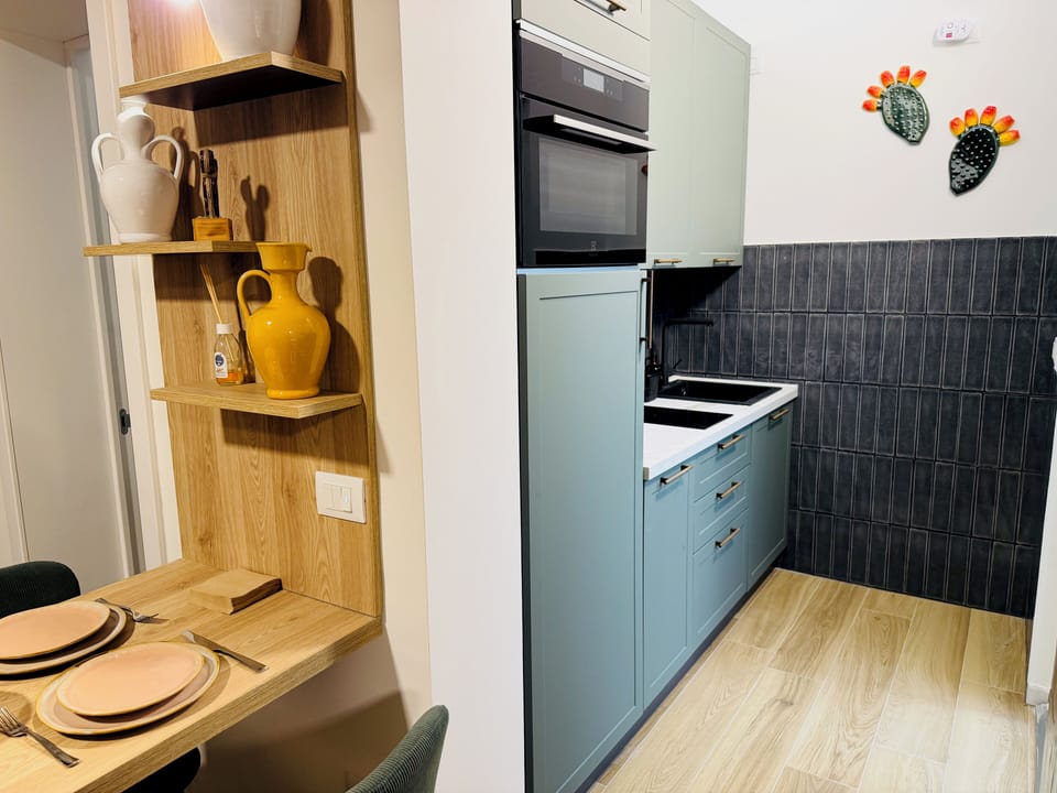 Apartment, Patio, Ground Floor | Private kitchen | Espresso maker, coffee/tea maker, electric kettle