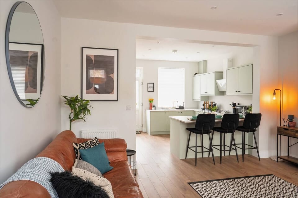 Open plan living, kitchen and dining with a modern touch