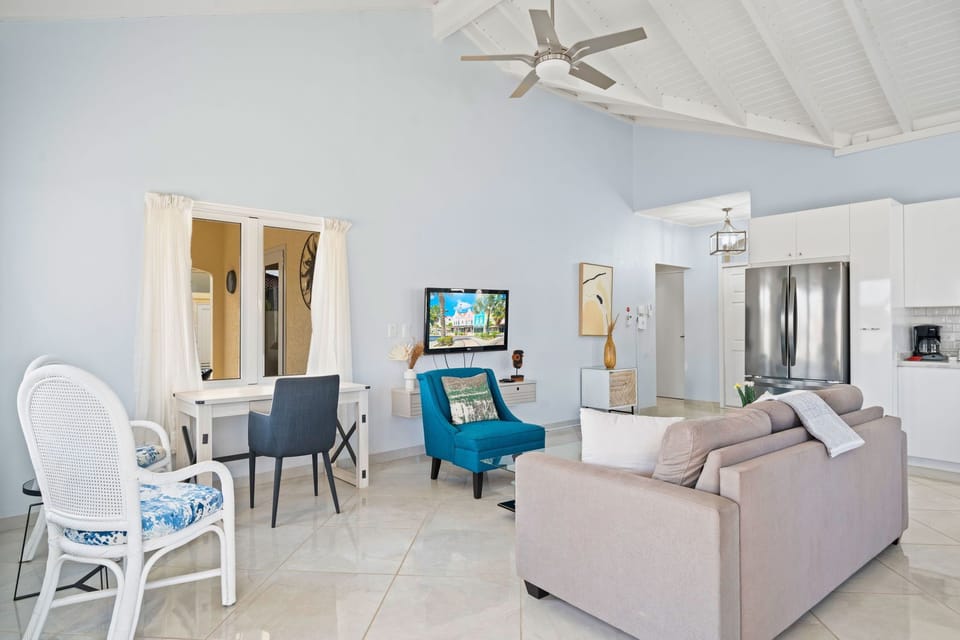 Living room with wall mounted flat screen smart TV