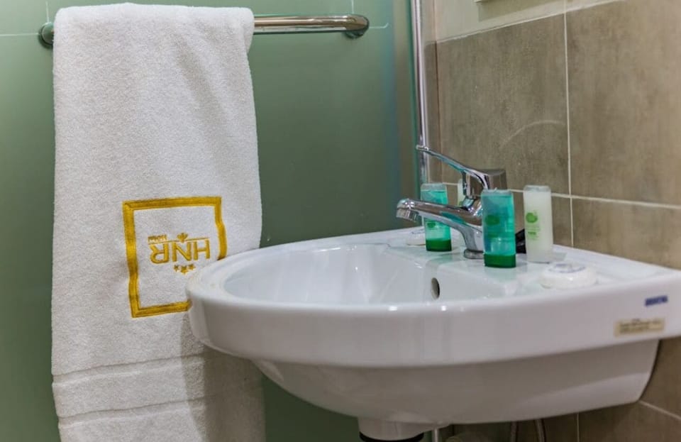 Double or Twin Room | Bathroom | Shower, free toiletries, towels, soap