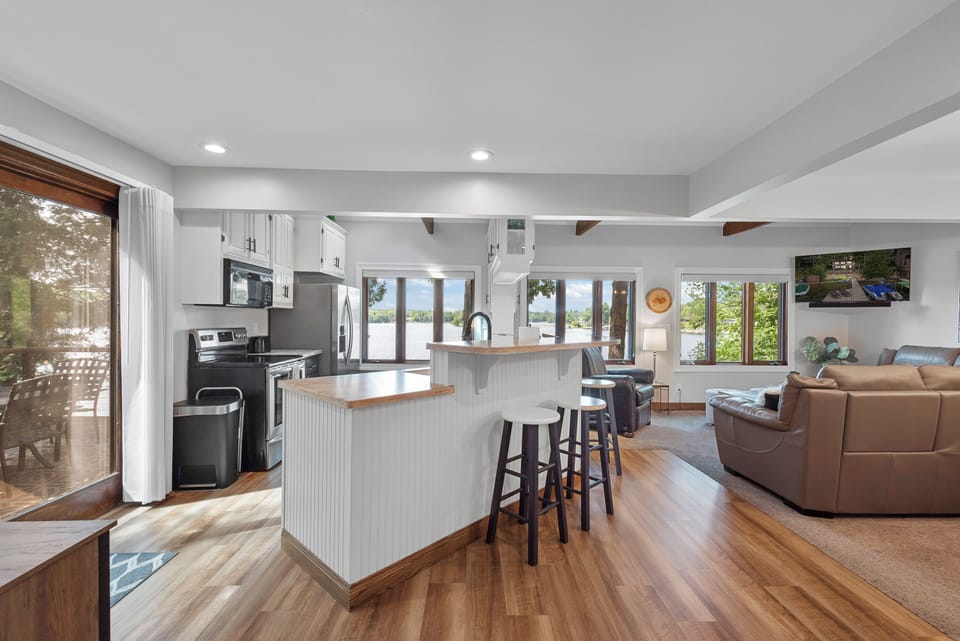 Open sightlines from the living area into the kitchen.