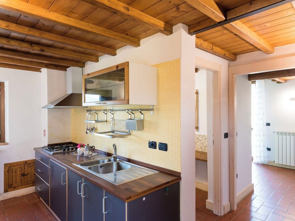 Kitchen, Countertop, Interior Design, Wood, Flooring, Kitchen Sink, Kitchen Appliance, Plumbing Fixture, Ceiling, Major Appliance