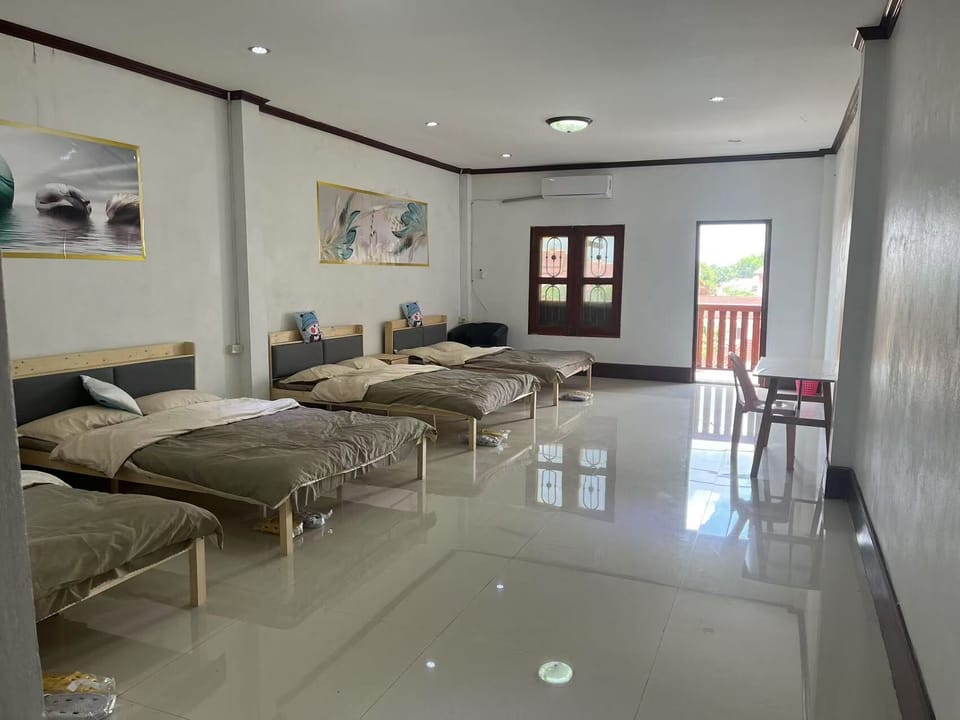 Comfort Quadruple Room, City View | Blackout drapes, soundproofing, iron/ironing board, free WiFi