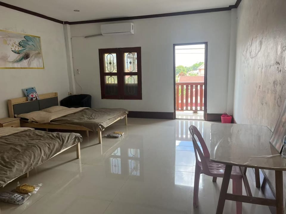 Comfort Quadruple Room, City View | Blackout drapes, soundproofing, iron/ironing board, free WiFi