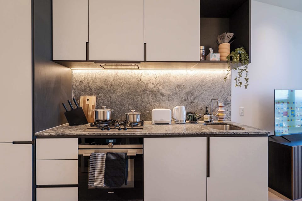Fully equipped kitchen with brand new appliances and cookware 