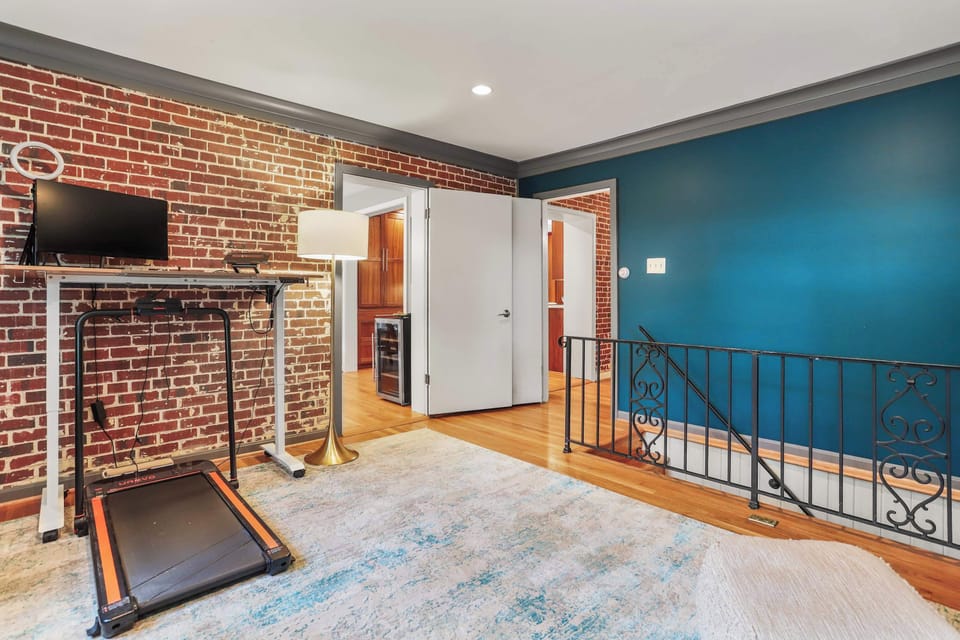 Work/study room with stairs leading to the 2 bedrooms on the lower level.