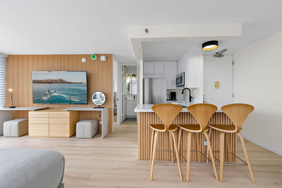 Sleek kitchen with a cozy island dining spot