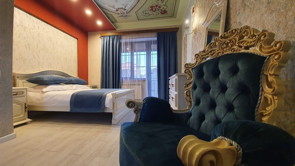 Deluxe Double Room, Balcony, City View | Iron/ironing board, free WiFi