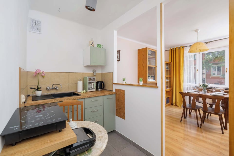 The kitchen area's practical layout maximizes functionality.