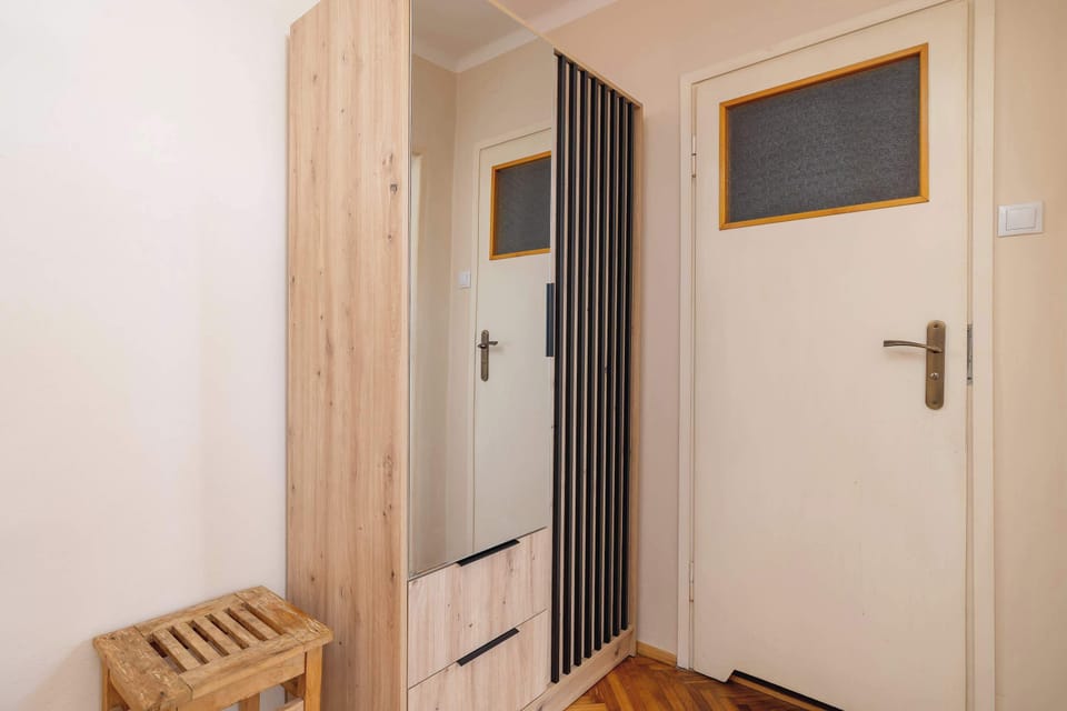 A capacious wardrobe, where the guests can store their belongings.