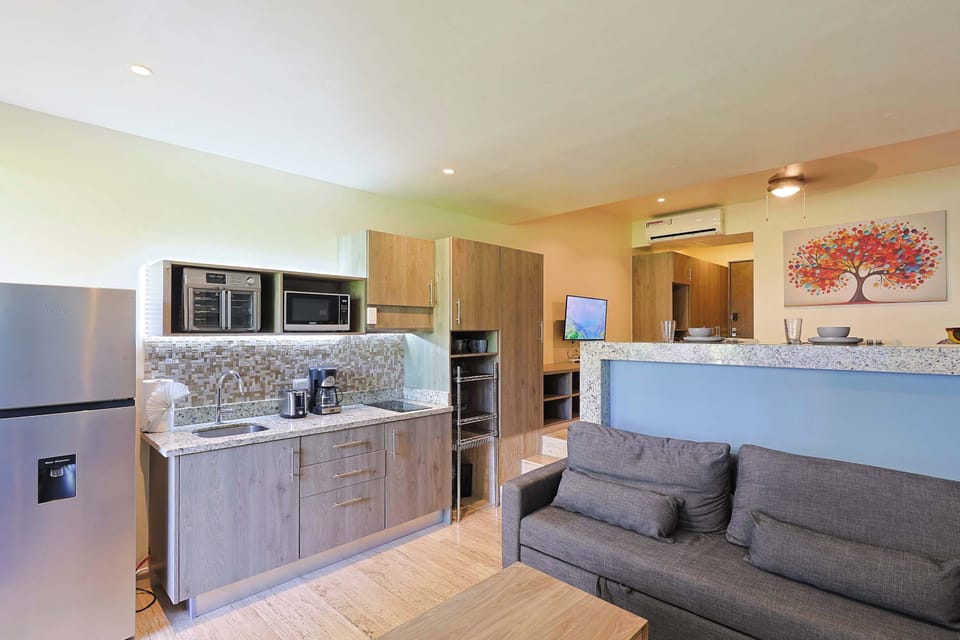 Modern kitchen with a cozy dining bar, perfect for morning coffee.