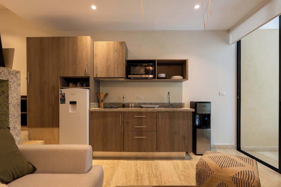 Prepare delicious meals in your fully equipped kitchen with modern appliances.