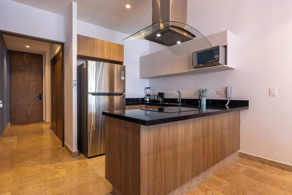 Sleek, full kitchen with ample counter space for all your cooking needs.