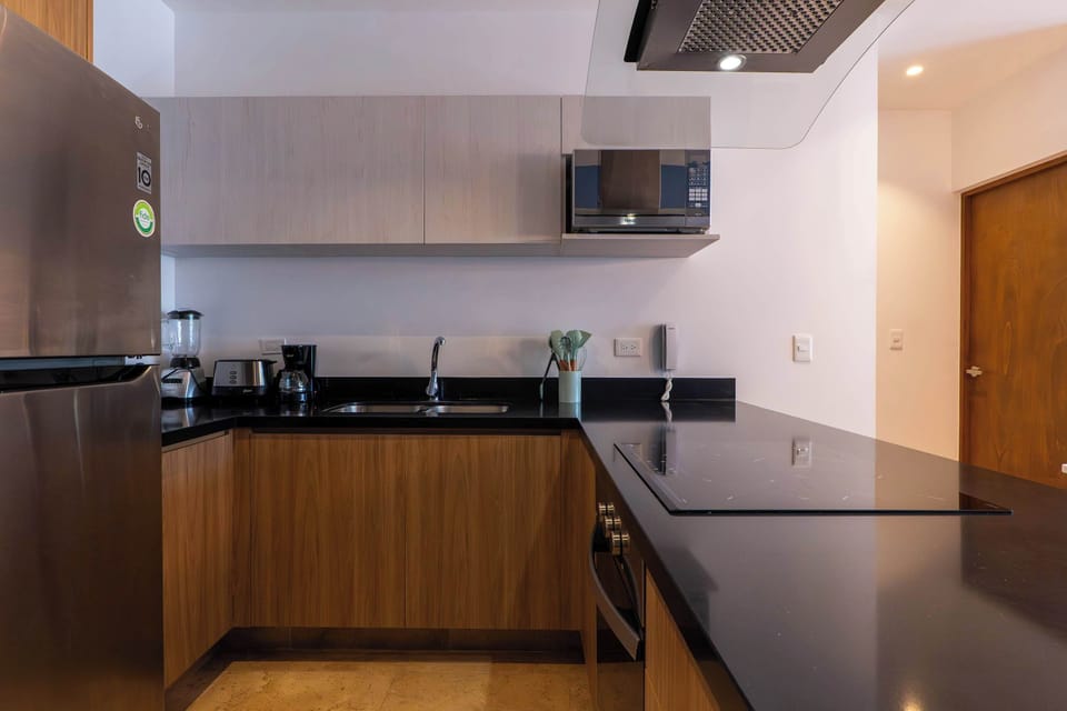 Modern kitchen with sleek design, ready for your culinary adventures.