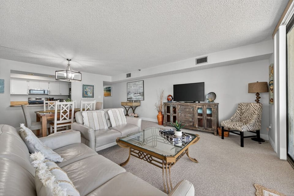Cozy lounge setup centered around a media console, ideal for relaxed evenings inside.