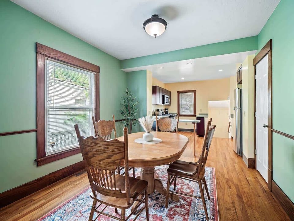 Bright dining room with natural light & cozy seating for family meals ️✨