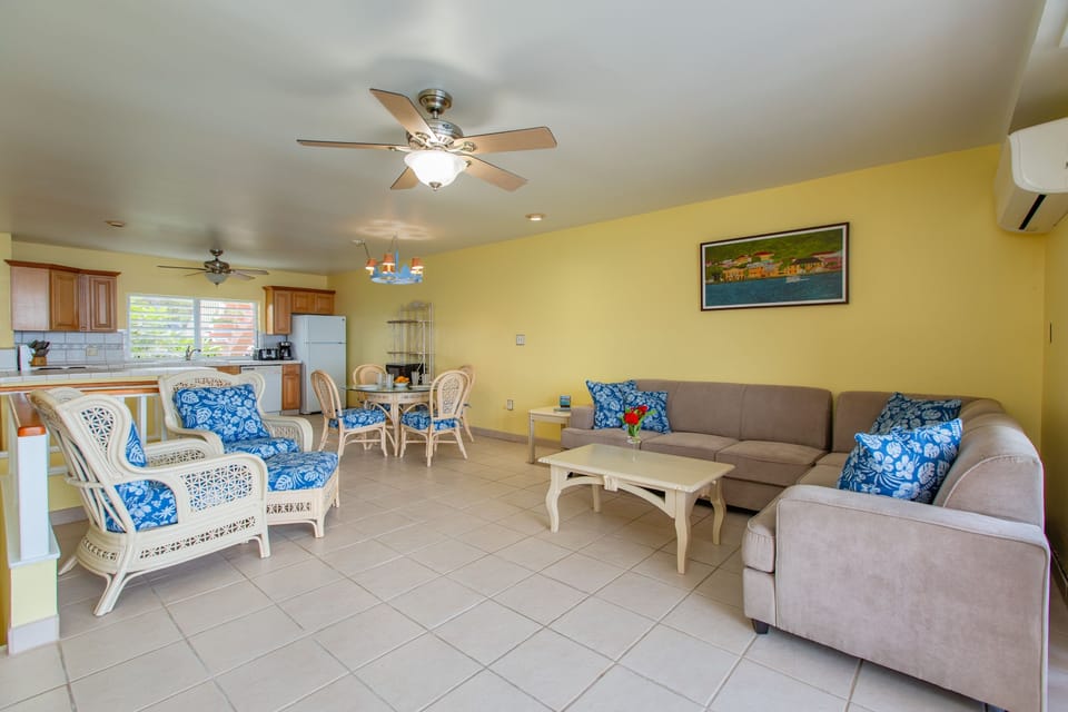 Dining and living area with easy flow and seating for relaxing or entertaining.