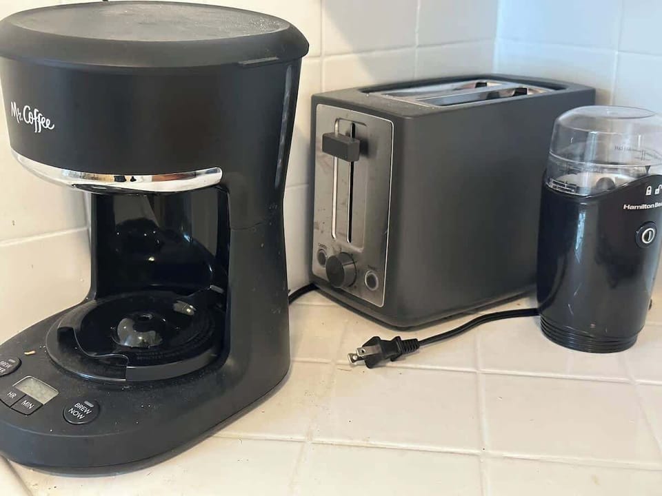 Coffee station with machine and toaster for convenience