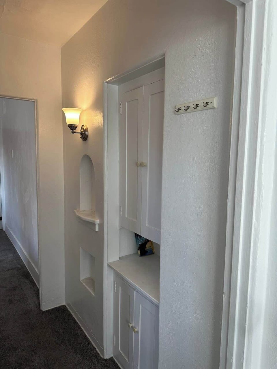 Hallway with clean design and warm lighting