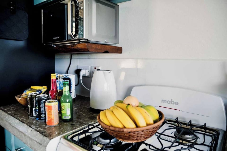 Studio, Balcony, Garden View | Private kitchen