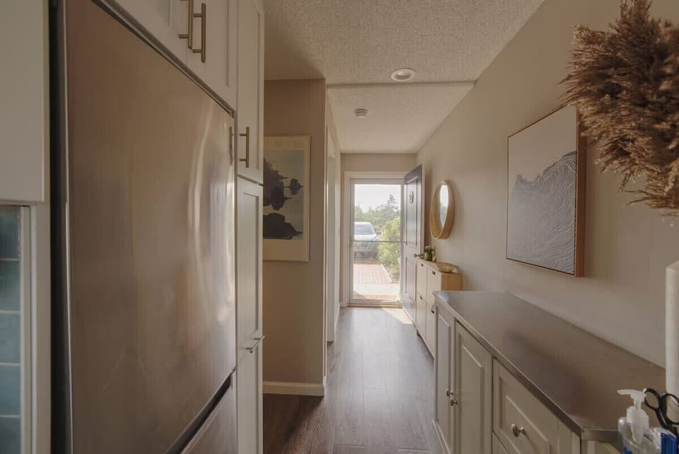 Bright hallway with built-in storage and natural light