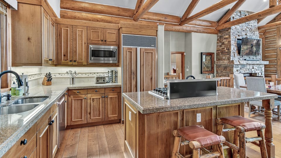 Kitchen, Main Level - Built in hood vent on the island