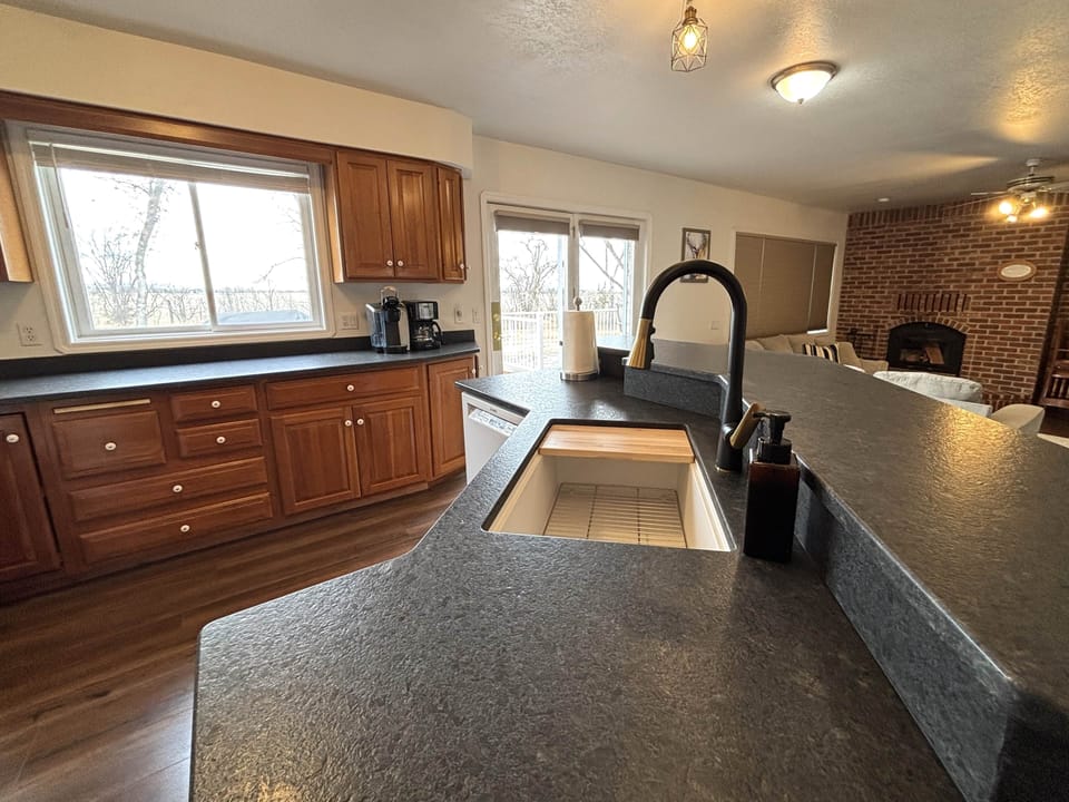 Sunlit kitchen ready for you to relax and enjoy. 