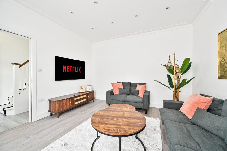 Smart TV with Netflix ,cozy sofas for unwinding after a day exploring London.