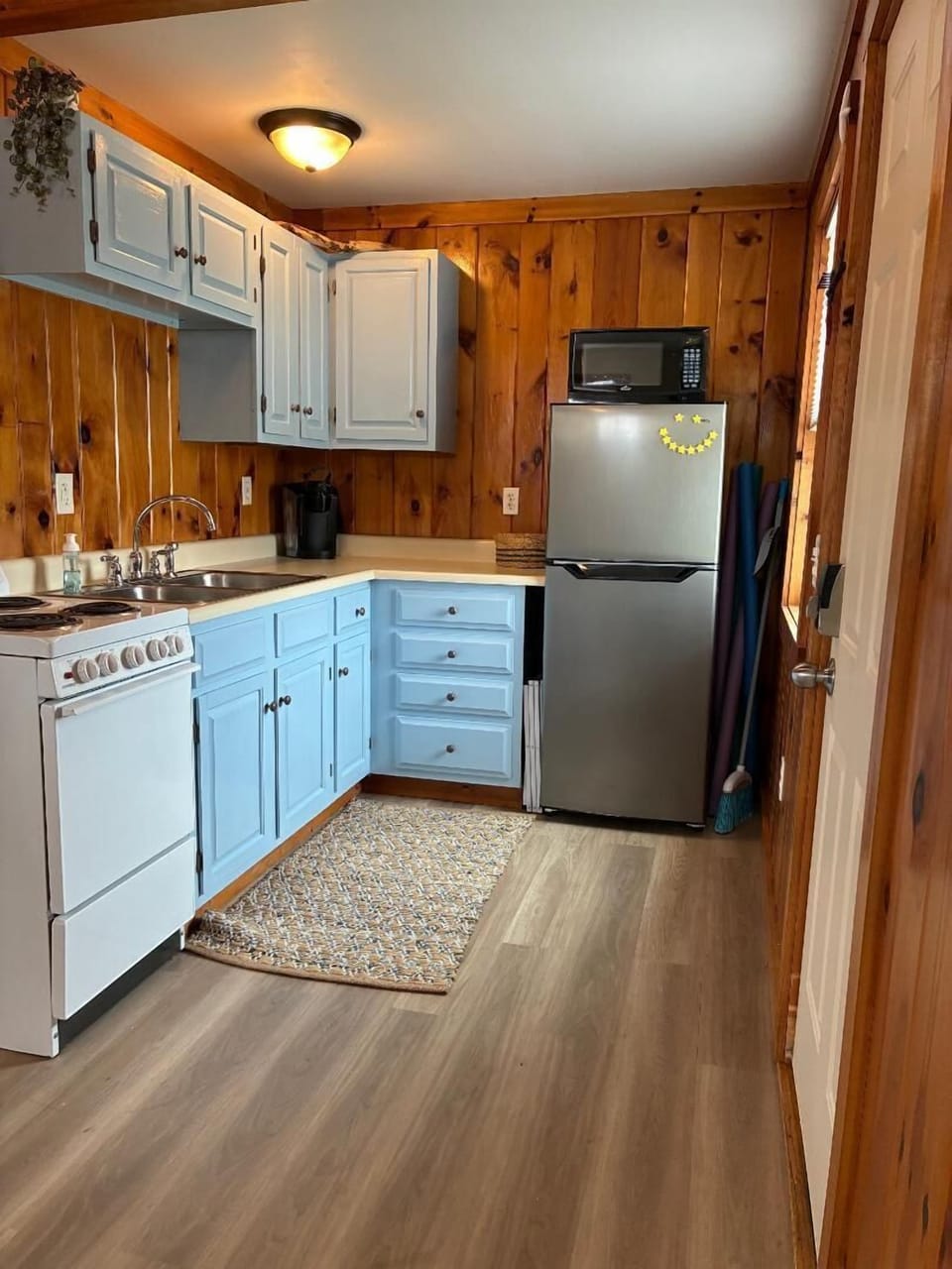 The kitchen has all you need to cook in or just make coffee and sit on the deck
