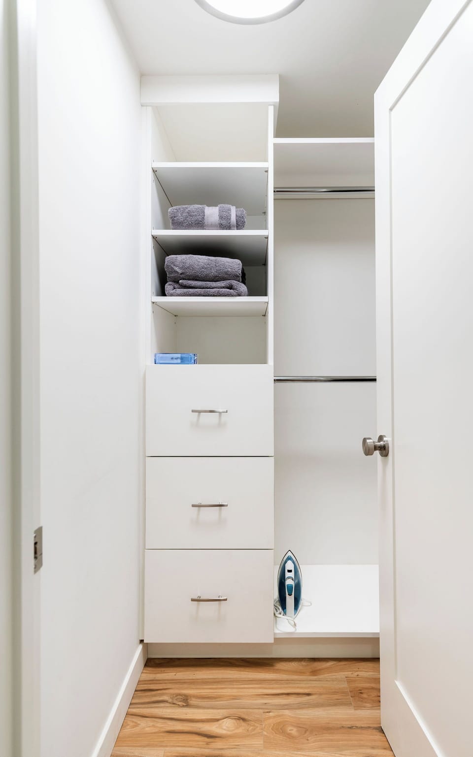 Contemporary walk-in closet for extra convenience 