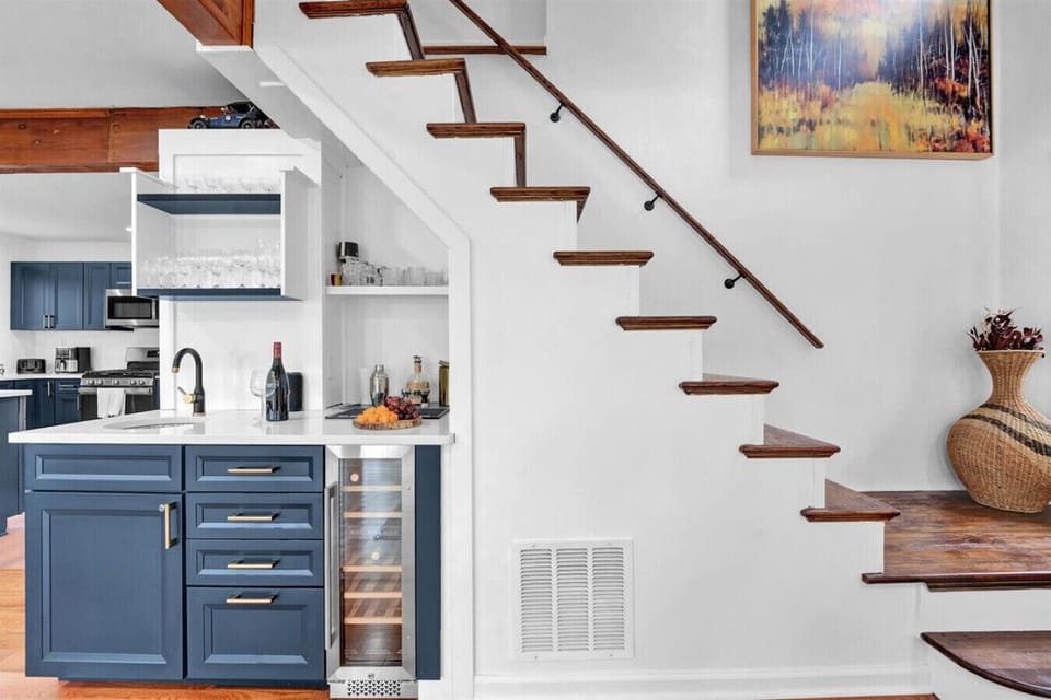 Perfect for unwinding — grab a cold drink from the mini fridge or mix one at the mini bar.