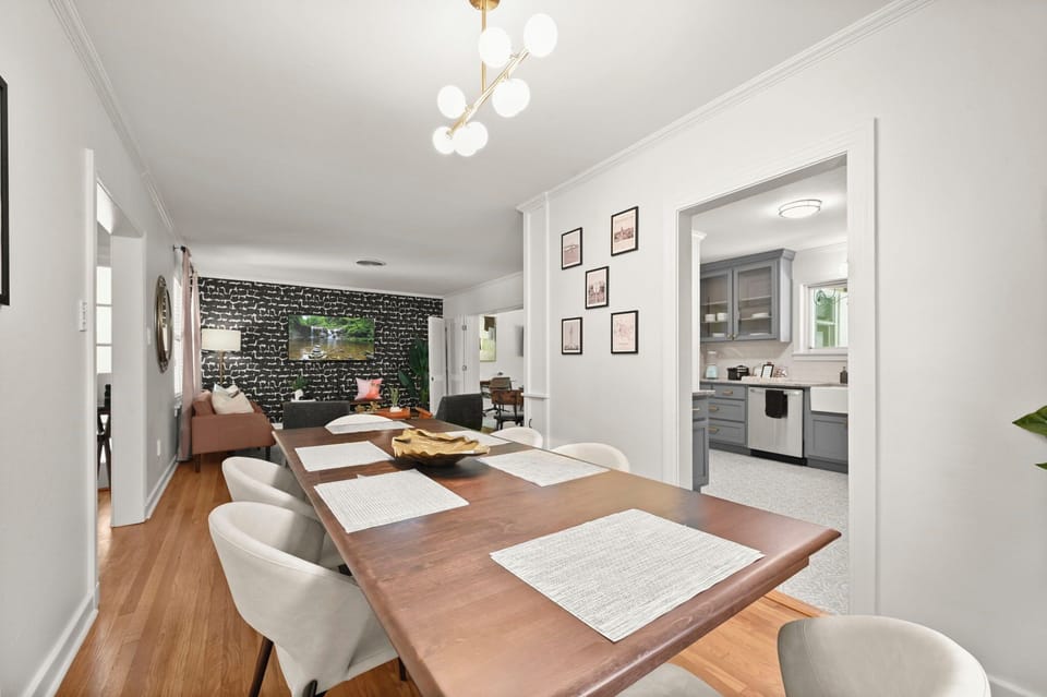Dining Room: Gather around the modern table for meals and laughter in this stylish space!