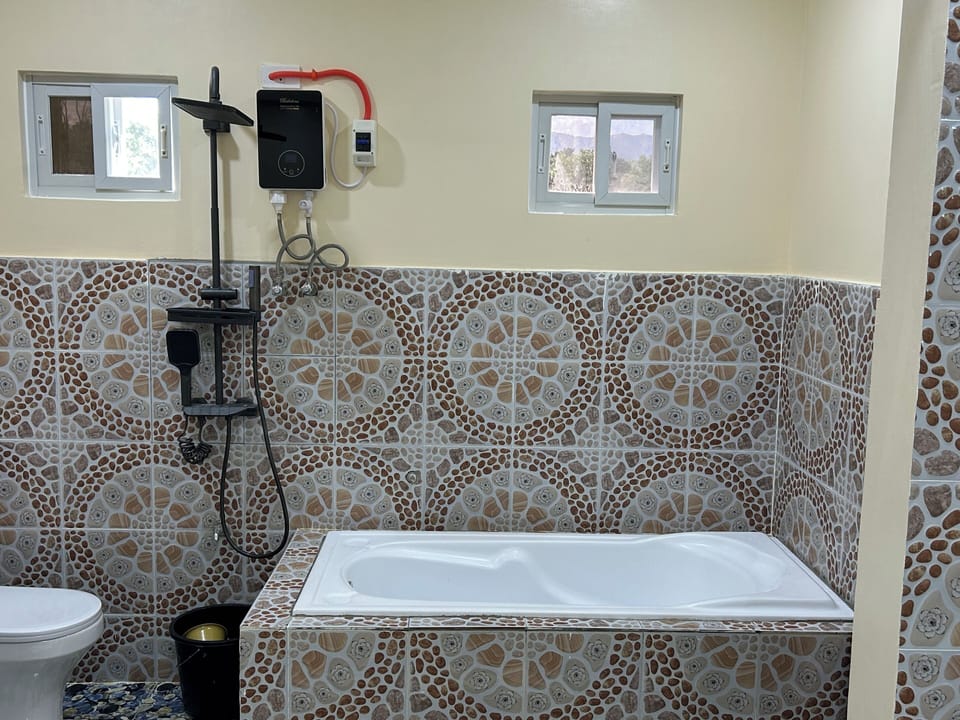 Double Room, Balcony, Mountain View | Bathroom | Shower, free toiletries, hair dryer (on request), slippers