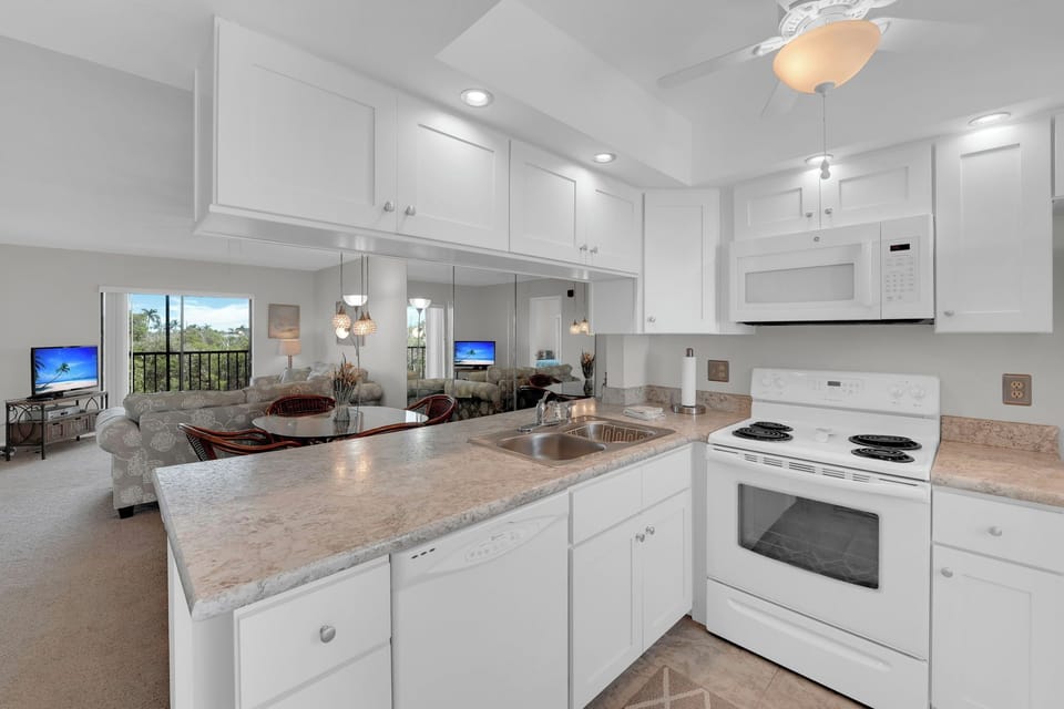 Prepare meals for yourself and guest in your island condo kitchen