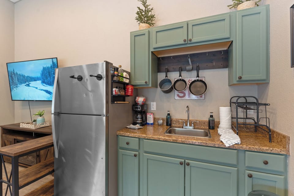 Prepare meals with the kitchenette.