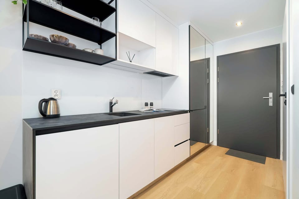 Modern, fully equipped kitchenette.